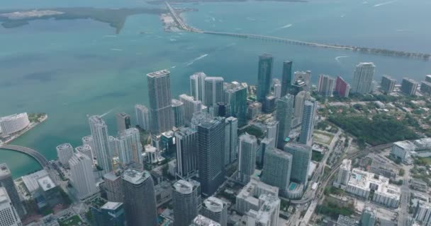 Aerial panoramic shot of modern high rise buildings. Group of skyscrapers in urban borough on sea coast. Miami, USA — Stock Video