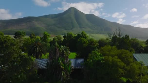 Rising Shot Buildings Lush Green Tropical Vegetation African Countryside Mountain — Video Stock