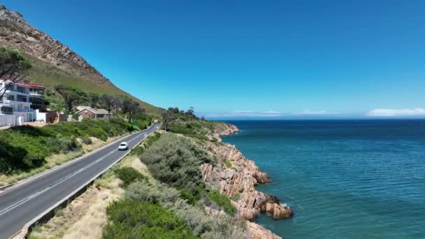 Car Driving Coastal Road Sunny Day Slide Pan Shot Rugged — Stock Video