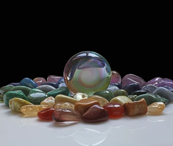 Crystal Ball surrounded by healing crystals — Stock Photo, Image