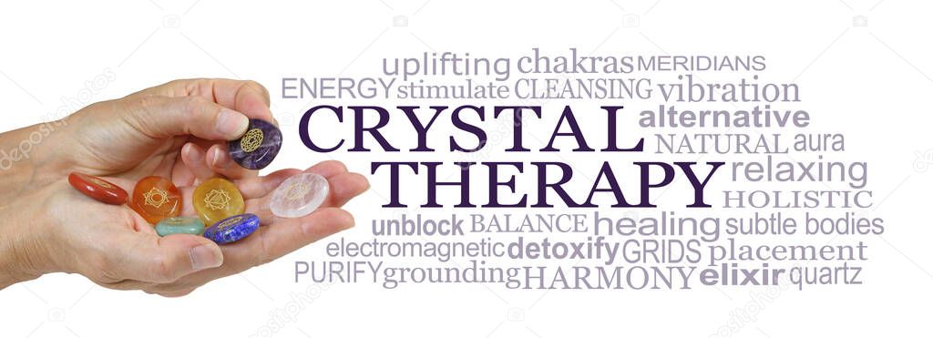 Offering you Crystal Therapy Word Cloud - female hands holding set of Crystal Chakra Symbol stones beside a CRYSTAL THERAPY word cloud against a white background