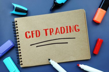 Business concept meaning CFD TRADING Contract For Difference with inscription on the sheet. clipart