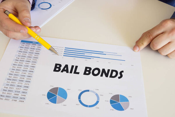 Financial concept meaning BAIL BONDS with phrase on the printout with diagrams and tables.