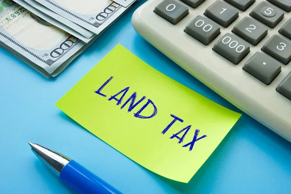 Foto Conceitual Sobre Land Tax Com Frase Manuscrita — Fotografia de Stock