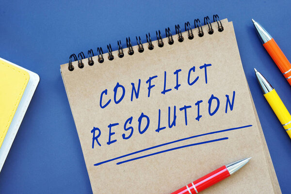 Business concept meaning Conflict Resolution with phrase on the piece of paper.