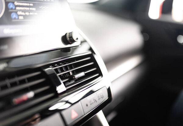 Винница, Украина - 14 апреля 2022 года: новый Mitsubishi Eclipse Cross. Подробности. Close up of LED headlights, bumper, hood, radiator grille, rear lights, side wings, mirrors.