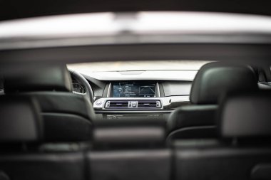 Modern car interior wide view with the leather panel, dashboard