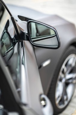 Car interior. Front handle door panel. Car open door window buttons