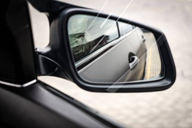 Side car mirror close-up. Details of the business car