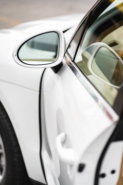 Side car mirror close-up. Details of the business car