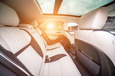 Car inside. Interior prestige modern car. Comfortable leather seats. Black cockpit with on isolated white background.