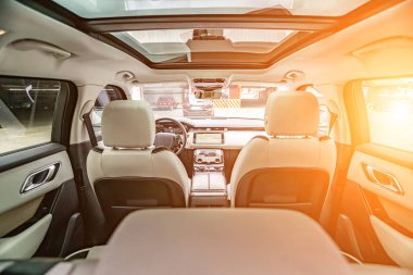 Modern car interior wide view with the leather panel, dashboard
