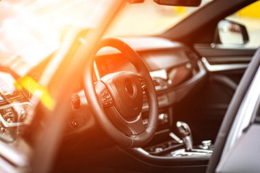 multimedia control panel on the steering wheel of modern car