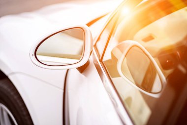 Side car mirror close-up. Details of the business car