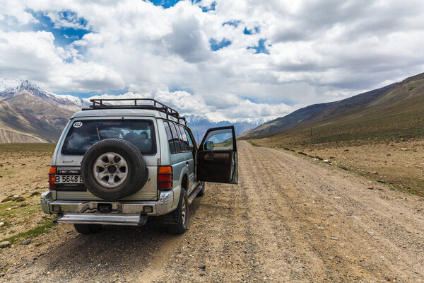 WAKHAN, TAJIKISTAN - CIRCA JUNE 2017: Off-road vehicle at  Wakhan in Tajikistan circa June 2017 in Wakhan.