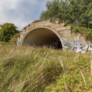 View of the post-Soviet hangars at the Podczel airport.