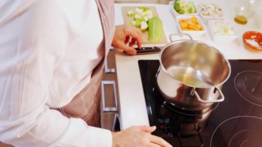 Timelapse of a man preparing a vegetable cream soup