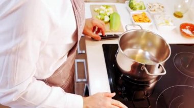 Timelapse of a man preparing a vegetable cream soup
