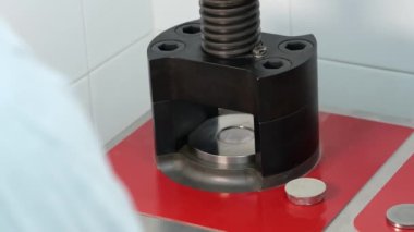 Preparation of samples for x-ray cement composition study in the laboratory.