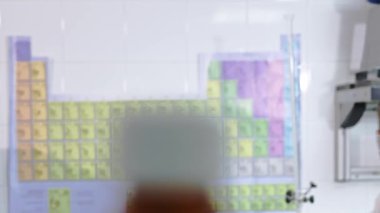 Scientist making a chemical test in the laboratory