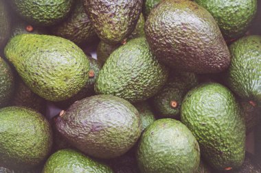 Pile of green Avocado background