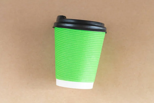 キャップトップビューのシングル使い捨てグリーンペーパーカップ — ストック写真