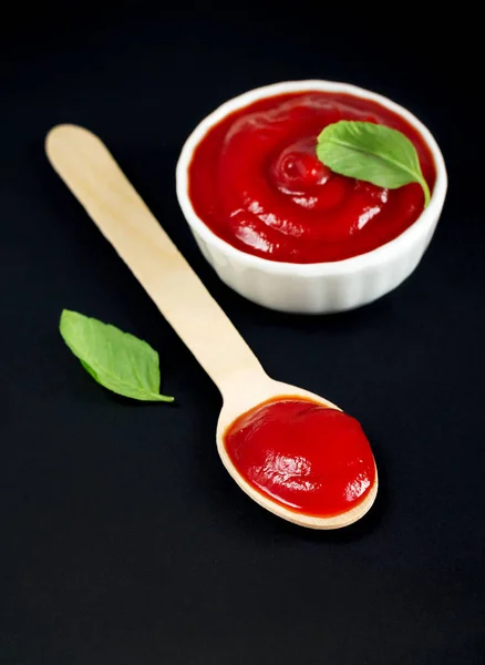 Close Ketchup Red Tomato Sauce Wooden Spoon White Bowl Black — Stock Photo, Image