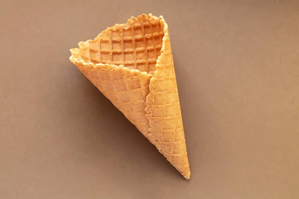 Single Empty Wafer Ice Cream Cone Brown Table Top View — Foto Stock