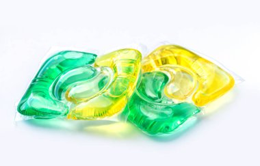 Gel laundry detergent or washing capsule pods isolated on white background