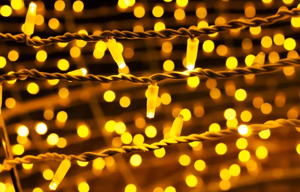 Defocused Street Light Bulbs Decor String Golden Lights Dark Background — Stockfoto