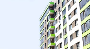 Fragment of new modern residential apartment building exterior. Detail of luxury home complex.