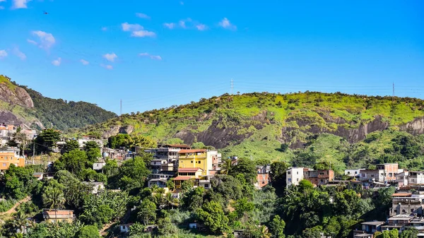 Communities known as favela are urban areas characterized by precarious housing and poor urban infrastructure. They are considered a consequence of the country\'s poor income distribution and housing deficit. Photo taken in Rio de Janeiro, Brazil.