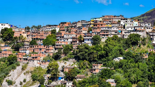 Communities known as favela are urban areas characterized by precarious housing and poor urban infrastructure. They are considered a consequence of the country's poor income distribution and housing deficit. Photo taken in Rio de Janeiro, Brazil.