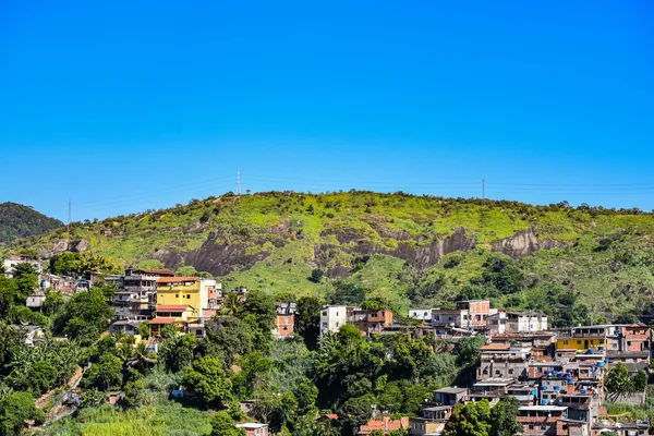 Communities known as favela are urban areas characterized by precarious housing and poor urban infrastructure. They are considered a consequence of the country's poor income distribution and housing deficit. Photo taken in Rio de Janeiro, Brazil.