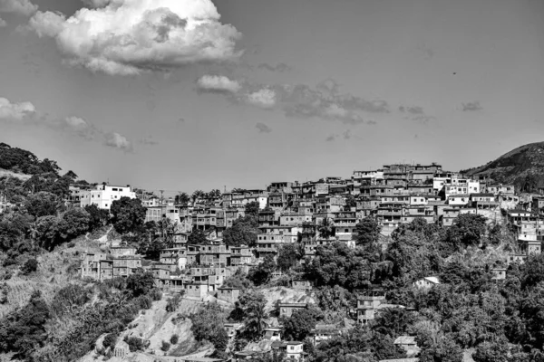 Communities known as favela are urban areas characterized by precarious housing and poor urban infrastructure. They are considered a consequence of the country's poor income distribution and housing deficit. Photo taken in Rio de Janeiro, Brazil.