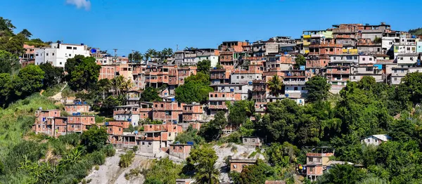 Communities known as favela are urban areas characterized by precarious housing and poor urban infrastructure. They are considered a consequence of the country\'s poor income distribution and housing deficit. Photo taken in Rio de Janeiro, Brazil.