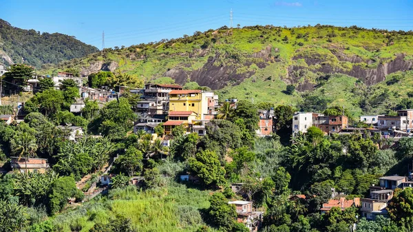 Communities known as favela are urban areas characterized by precarious housing and poor urban infrastructure. They are considered a consequence of the country's poor income distribution and housing deficit. Photo taken in Rio de Janeiro, Brazil.