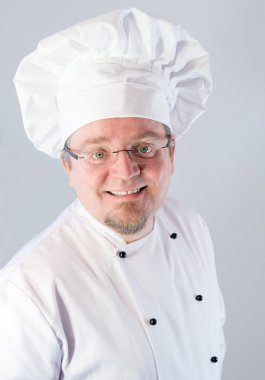 aşçı Şef beyaz üzerinde gülümseyen