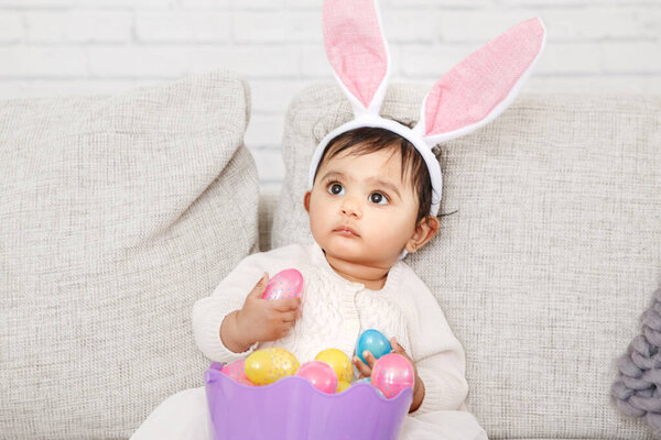 Cute Indian Baby Girl Pink Bunny Ears Basket Colorful Eggs Royalty Free Stock Photos
