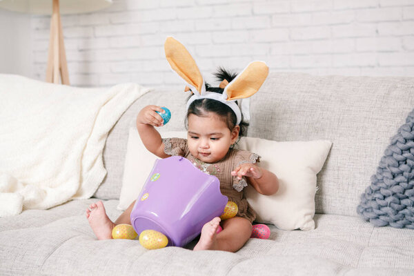 Cute Indian Baby Girl Pink Bunny Ears Basket Colorful Eggs Royalty Free Stock Images