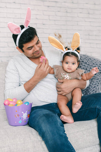 Indian Father Baby Girl Daughter Bunny Ears Playing Toy Eggs Stock Photo