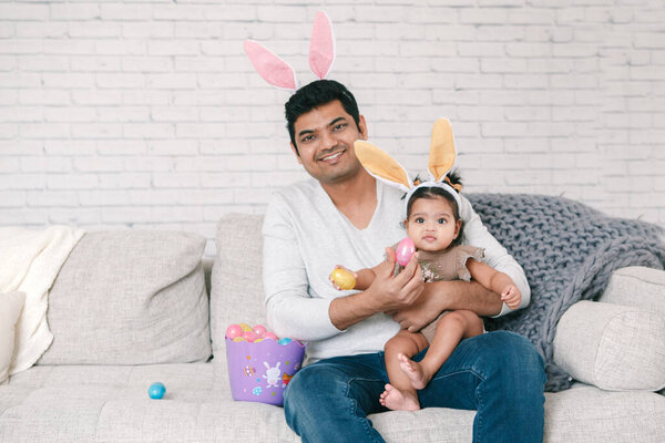Indian Father Baby Girl Daughter Bunny Ears Playing Toy Eggs Stock Photo