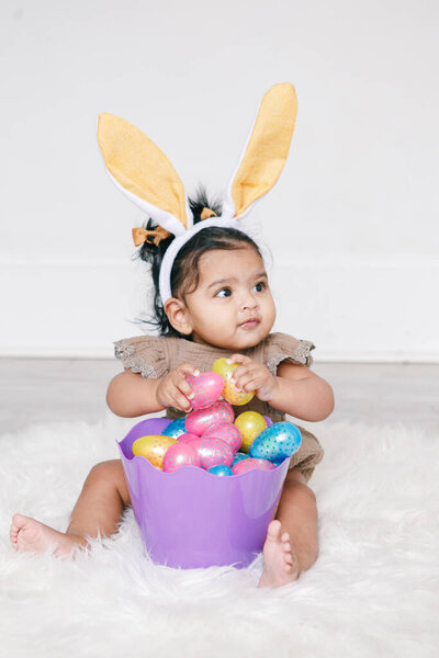 Cute Indian Baby Girl Pink Bunny Ears Basket Colorful Eggs Royalty Free Stock Images