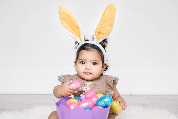 Cute Indian Baby Girl Pink Bunny Ears Basket Colorful Eggs Royalty Free Stock Images