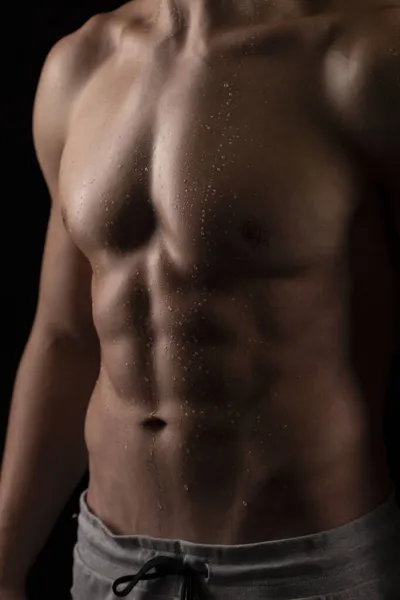 Mann zeigt ABS. Muskelmann posiert. Starkes Körperkonzept. Oben ohne Sportman Bodybuilder. Six Pack — Stockfoto
