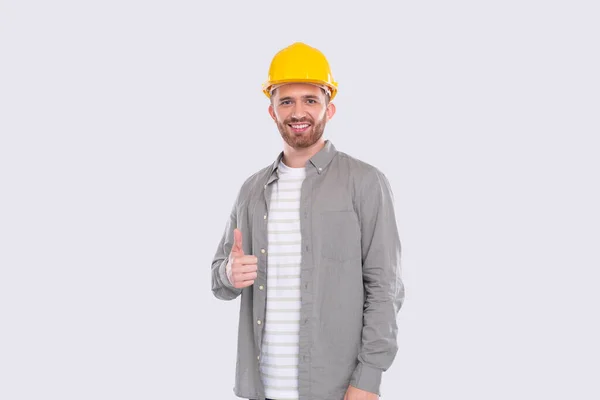 Trabajador de la construcción mostrando el pulgar hacia arriba Aislamiento de fresado de pie — Foto de Stock