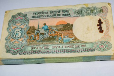 Old Five Rupee notes combined on the table, India money on the rotating table. Old Indian Currency notes on a rotating table, Indian Currency on the table