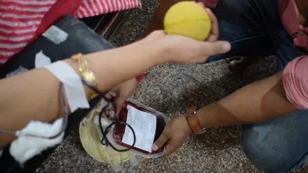 Blood Donor Blood Donation Camp Held Bouncy Ball Holding Hand — 图库视频影像