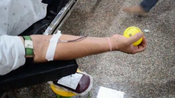 Blood Donor Blood Donation Camp Held Bouncy Ball Holding Hand — Stock video