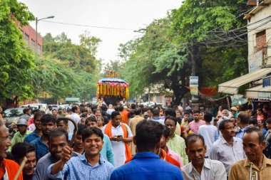 New Delhi, India July 01 2022 - A huge gathering of devotees from different parts of Delhi on the occasion of ratha yatra or rathyatra. Rath for Lord Jagannath pulled by people, Jagannath Rath Yatra